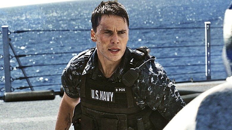 Taylor Kitsch looks worried