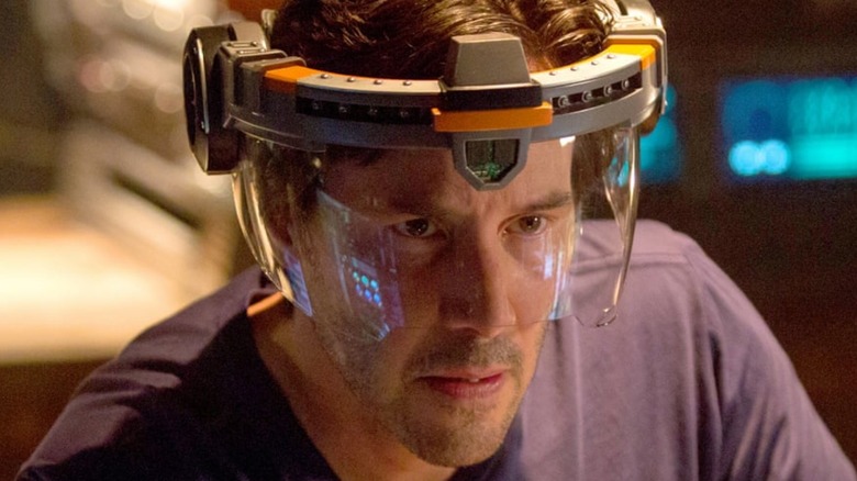 Keanu Reeves wearing goofy headset