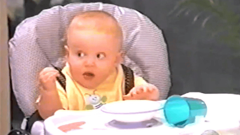 Bob (Jaeger Rowdy Held) in high chair in Baby Bob