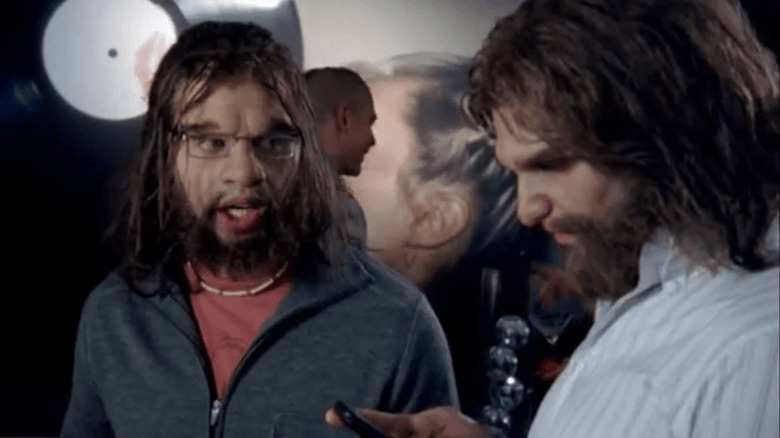 Nick (Nick Kroll) and Joel (Bill English) at party in Cavemen