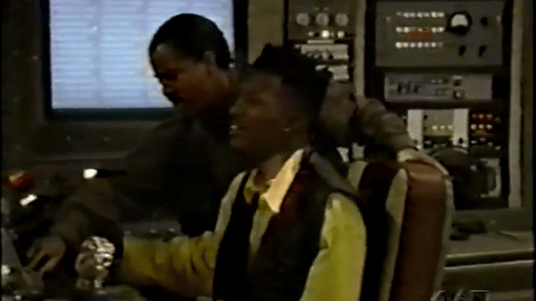 Ty (Flex) and Morris (Darryl M. Bell) flying ship in Homeboys in Outer Space