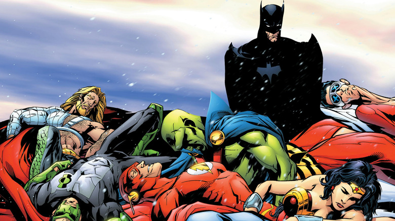 Batman surrounded by his fallen teammates