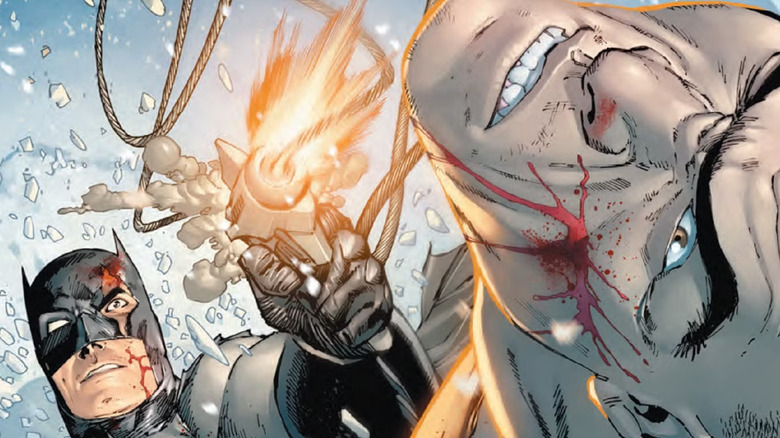Batman shoots KGBeast with a grappling hook