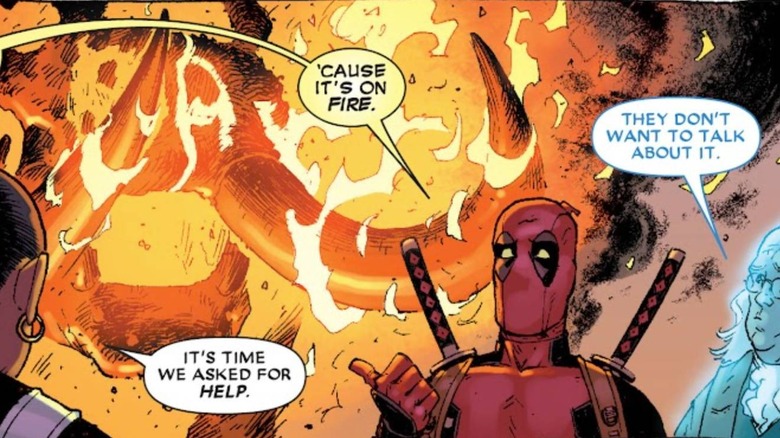 Deadpool pointing at burning elephant in Marvel Comics
