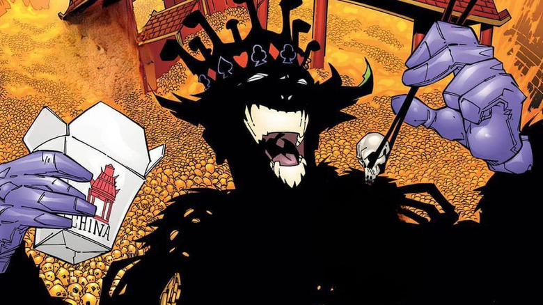 The Joker eats a skull with chopsticks as China burns behind him