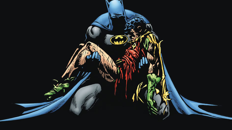 Batman cradles the corpse of Jason Todd (PLACEHOLDER)