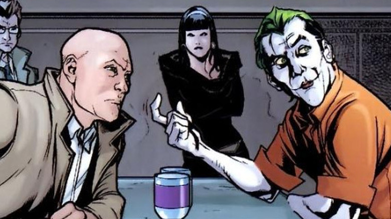 The Joker asks Lex Luthor to lean in close as Mercy watches