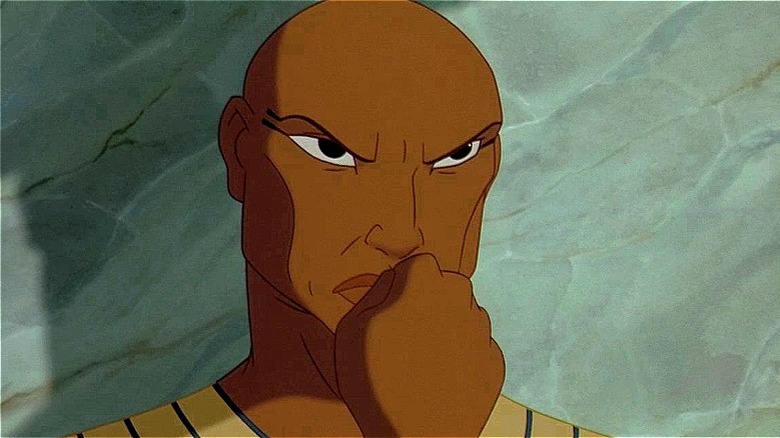 Rameses hand on face