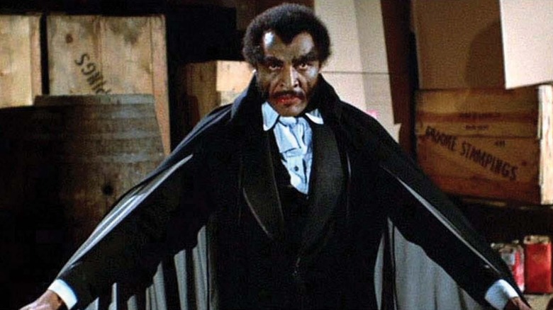 Blacula grimacing