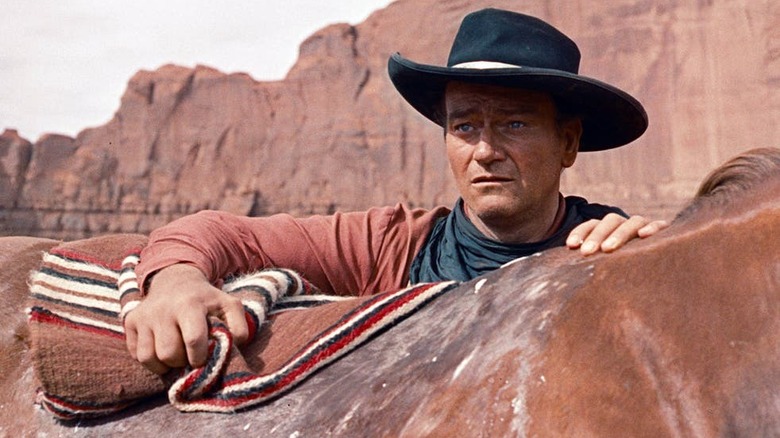 John Wayne looks over mountain