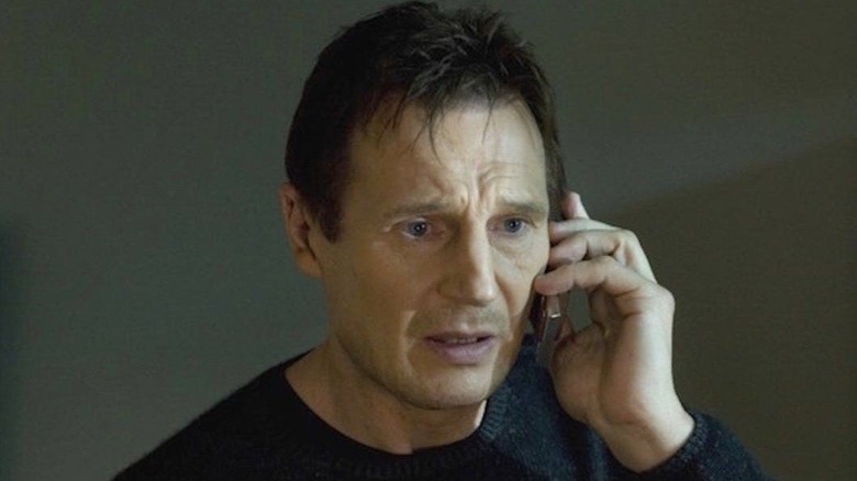 Liam Neeson on phone