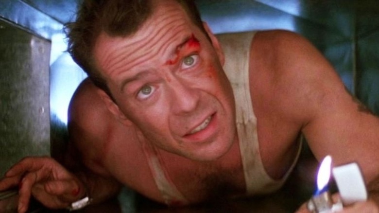 Bruce Willis as John McClane