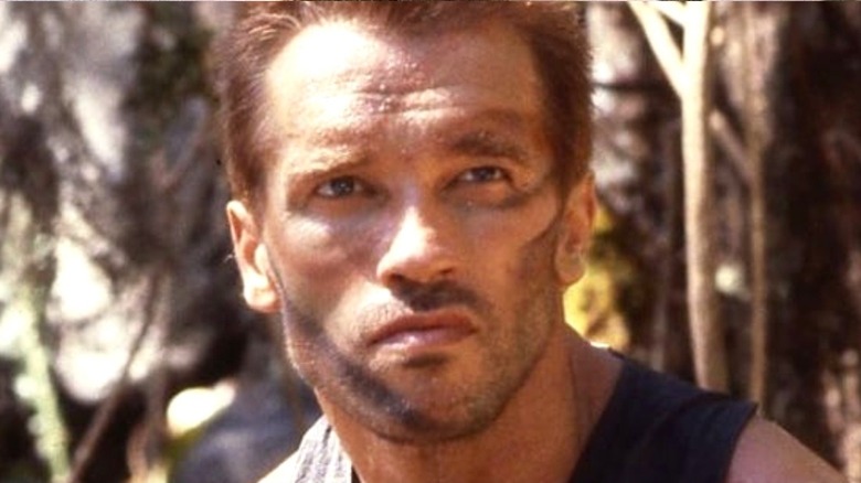 Schwarzenegger in Predator face paint