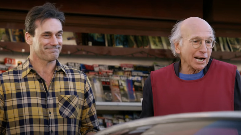 Larry David and Jon Hamm smiling