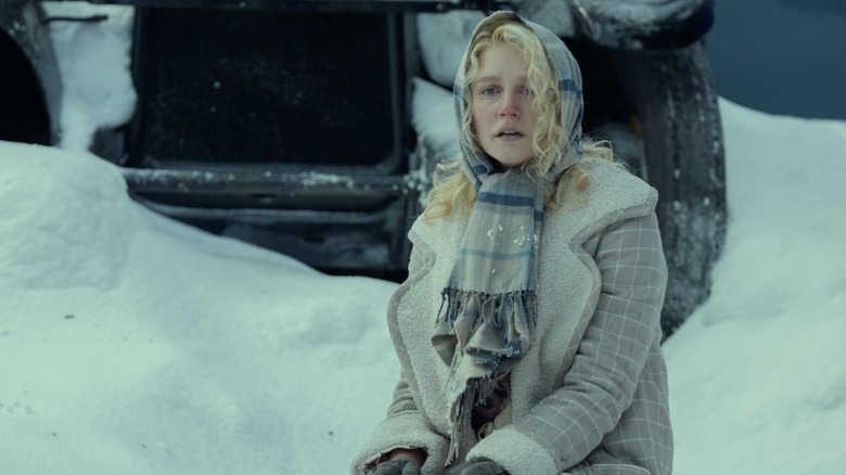 Alexandra Dutton kneeling in the snow