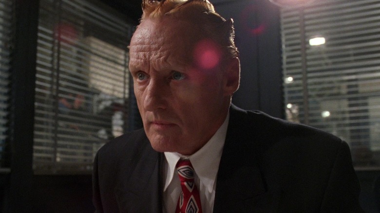 Dennis Hopper looking curious as President "King" Koopa in Super Mario Bros.