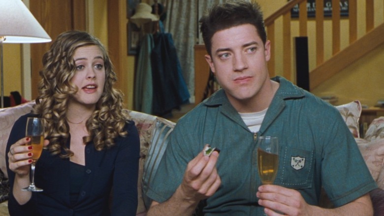 Alicia Silverstone Brendan Fraser drinking champagne