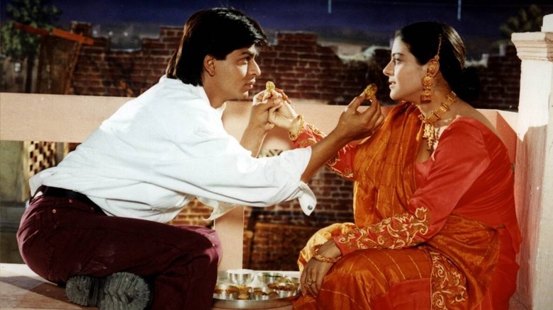 Shah Rukh Khan Kajol feeding each other
