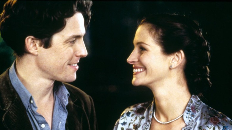 Hugh Grant Julia Roberts smiling at each other