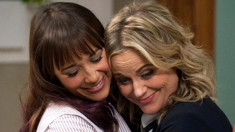 Rashida Jones and Amy Poehler hugging