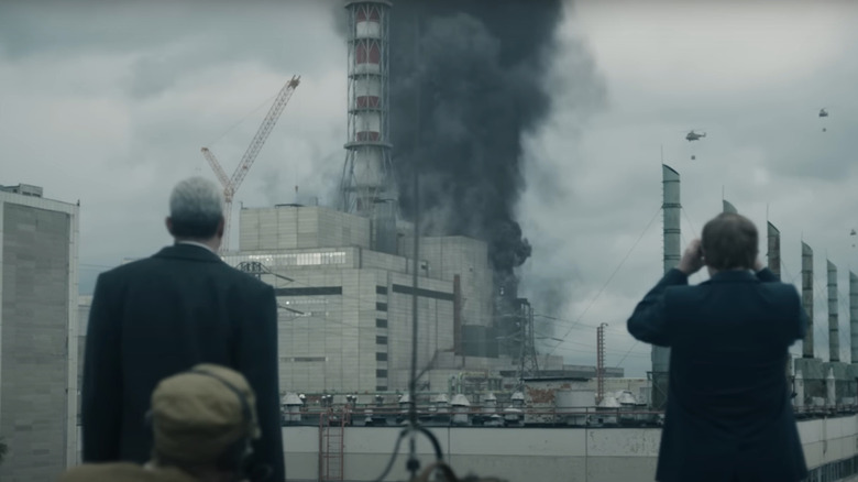 Valery Legasov and Boris Shcherbina, watching smoke build in the sky from a nuclear power plant in HBO's Chernobyl