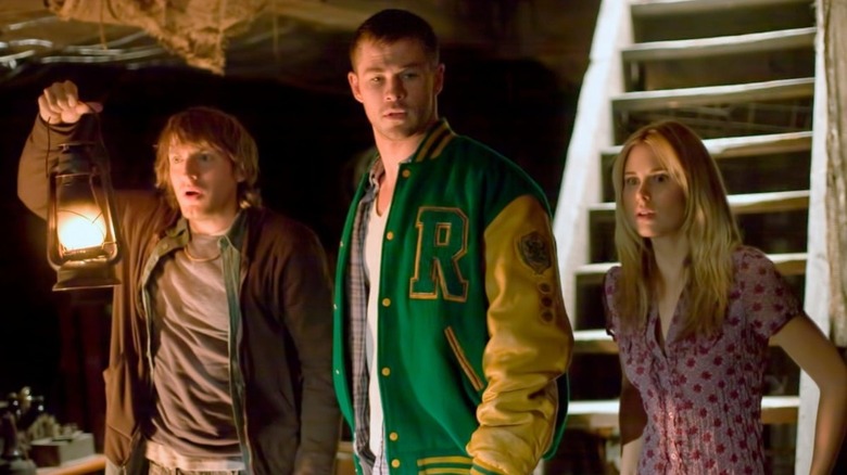 The cast of "The Cabin in the Woods" in basement