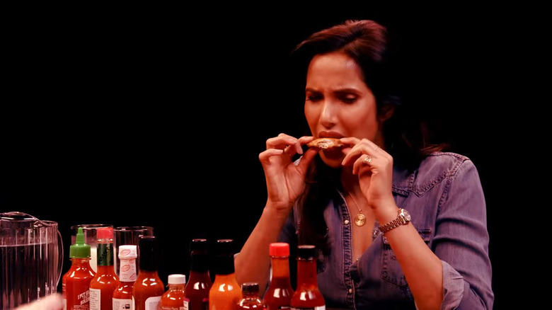 Padma Lakshmi eats wings