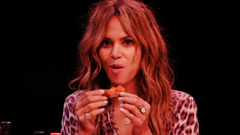 Halle Berry eating wings