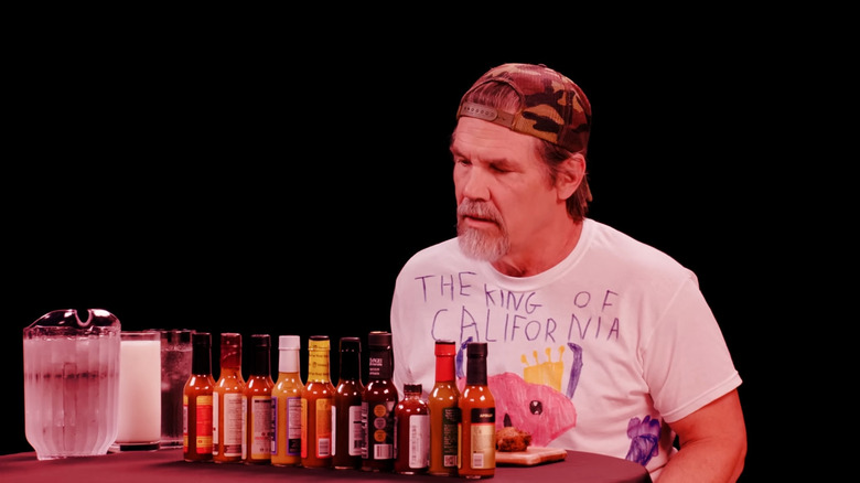 Josh Brolin staring at wings