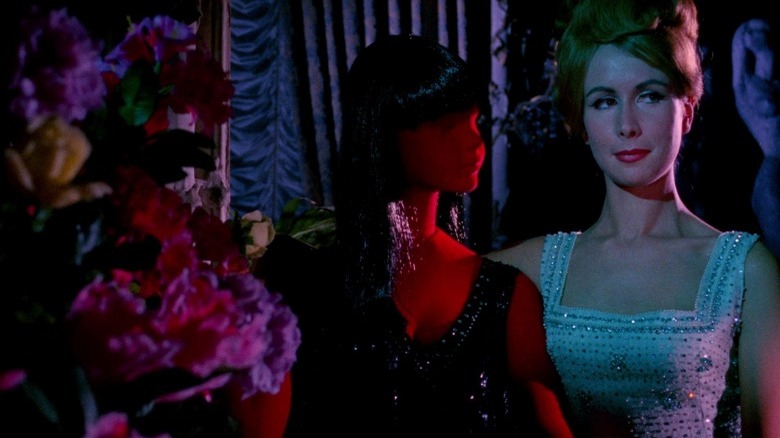 blood and black lace stand by red mannequin