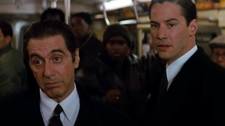Keanu Reeves and Al Pacino in a subway