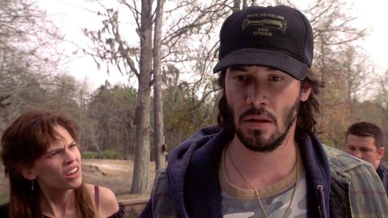 Keanu Reeves and Hillary Swank looking shocked