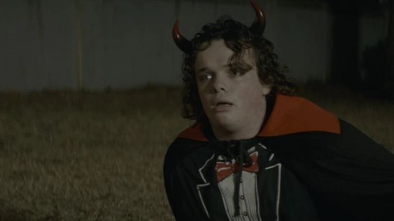 oscar in halloween wearing devil costume