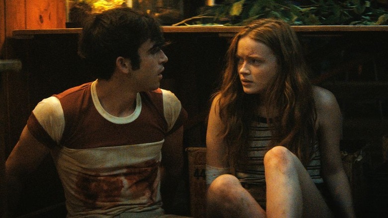 Sadie Sink and Ted Sutherland hiding