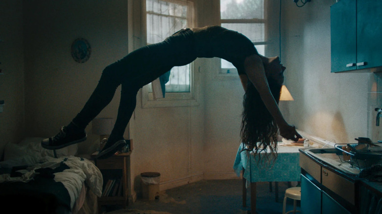 Maud (Morfydd Clark) floats in rapture in Saint Maud