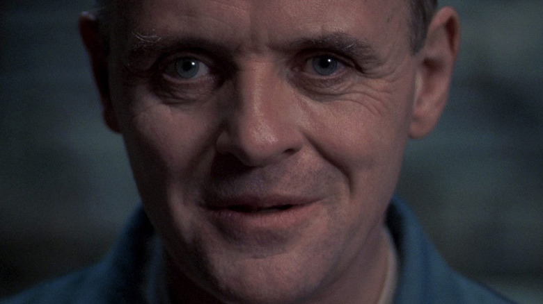 Hannibal Lecter (Anthony Hopkins) grins menacingly in Silence of the Lambs