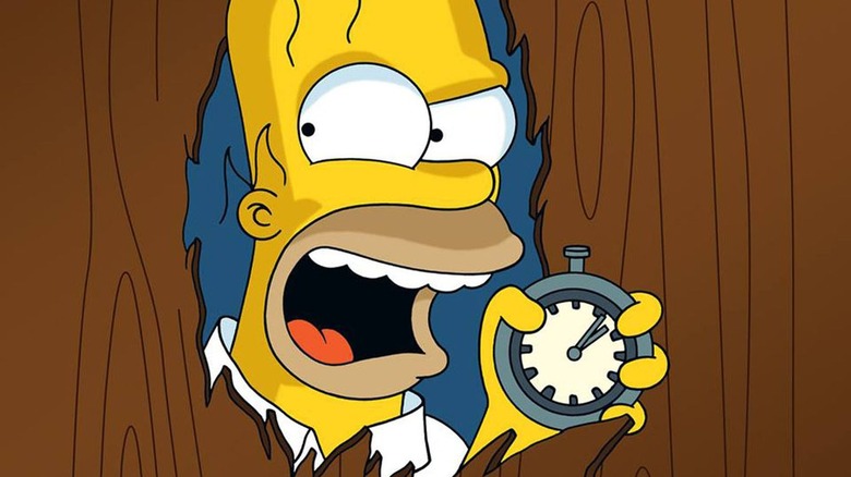 Homer holding stopwatch