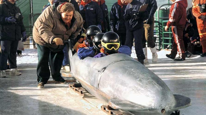 John Candy gives bobsled a push in Cool Runnings