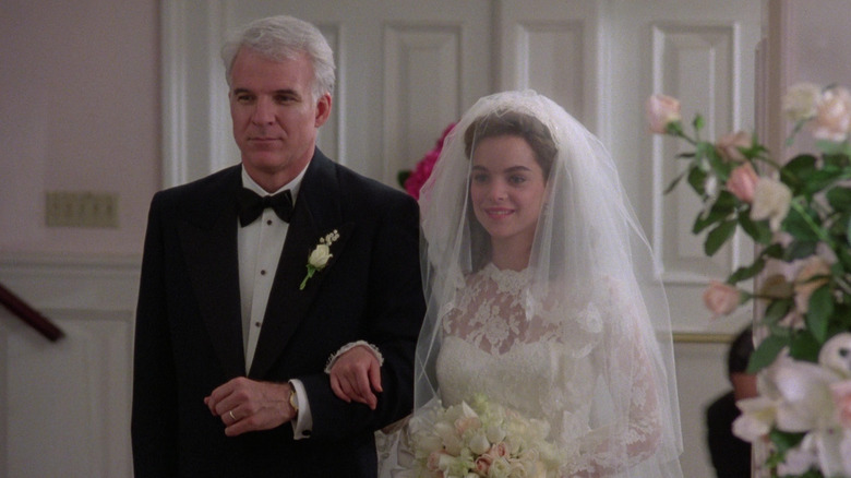 George Banks walks his daughter, Annie, down the aisle at her wedding.