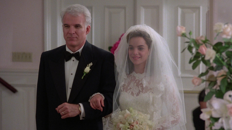 George Banks walks his daughter, Annie, down the aisle at her wedding.