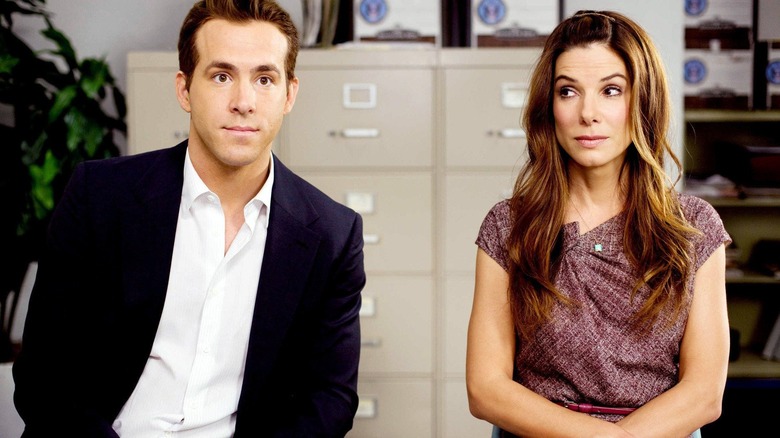 Margaret Tate and Andrew Paxton sit awkwardly in an office.