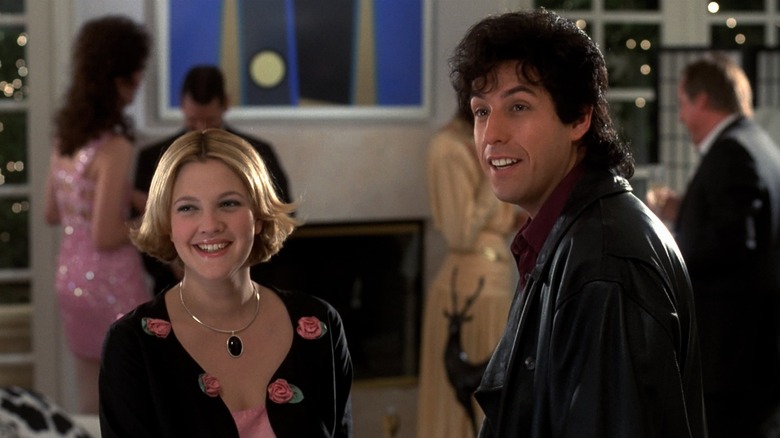 Robbie and Julia smiling in conversation.