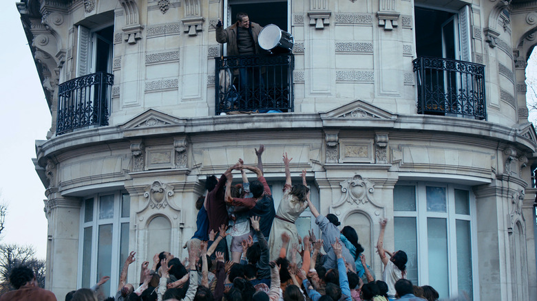 The Night Eats the World's zombies reach up to second story window