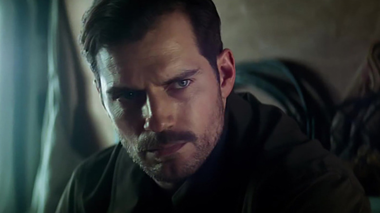 Henry Cavill as August Walker sitting in a helicopter in Mission: Impossible -- Fallout