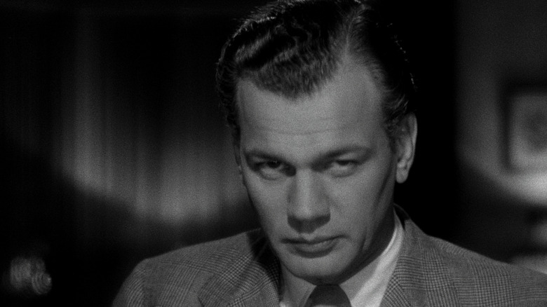 Joseph Cotten as Charles Oakley glaring into camera in Shadow of a Doubt