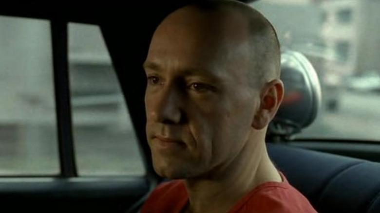 Kevin Spacey as John Doe in the back of a police car in Se7en