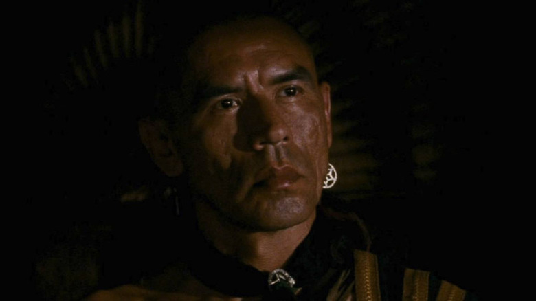 Wes Studi as Magua staring coldly in The Last of the Mohicans