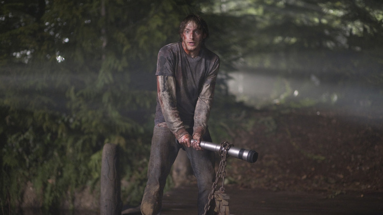 Fran Kranz with weapon
