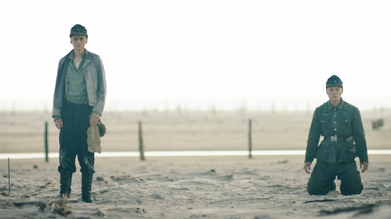 Young prisoners on beach