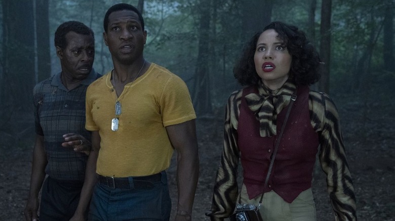 Jurnee Smollet, Courtney B Vance and Jonathan Majors